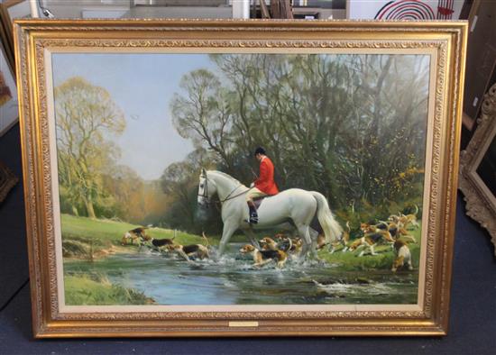§ Frank Wootton (1911-1996) Huntsman and hounds crossing a stream 28 x 40in.